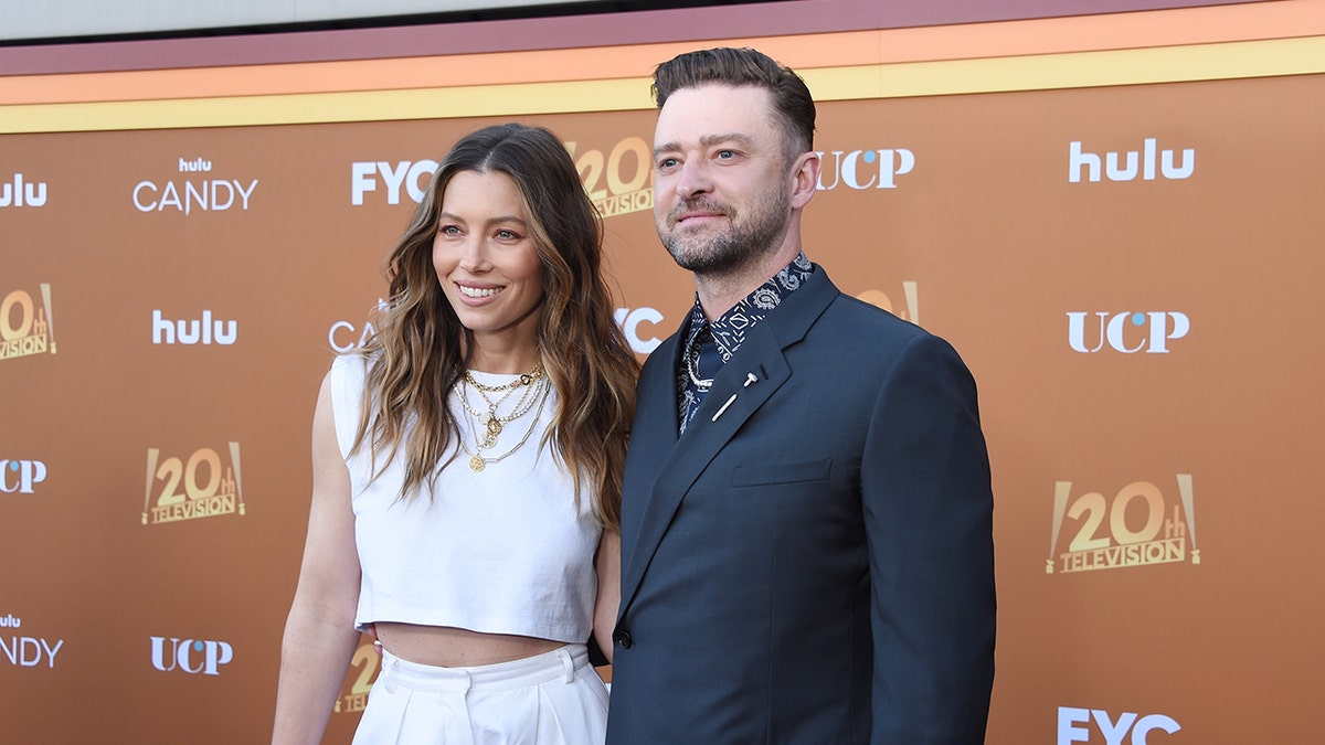 Jessica Biel and Justin Timberlake posing on a red carpet together