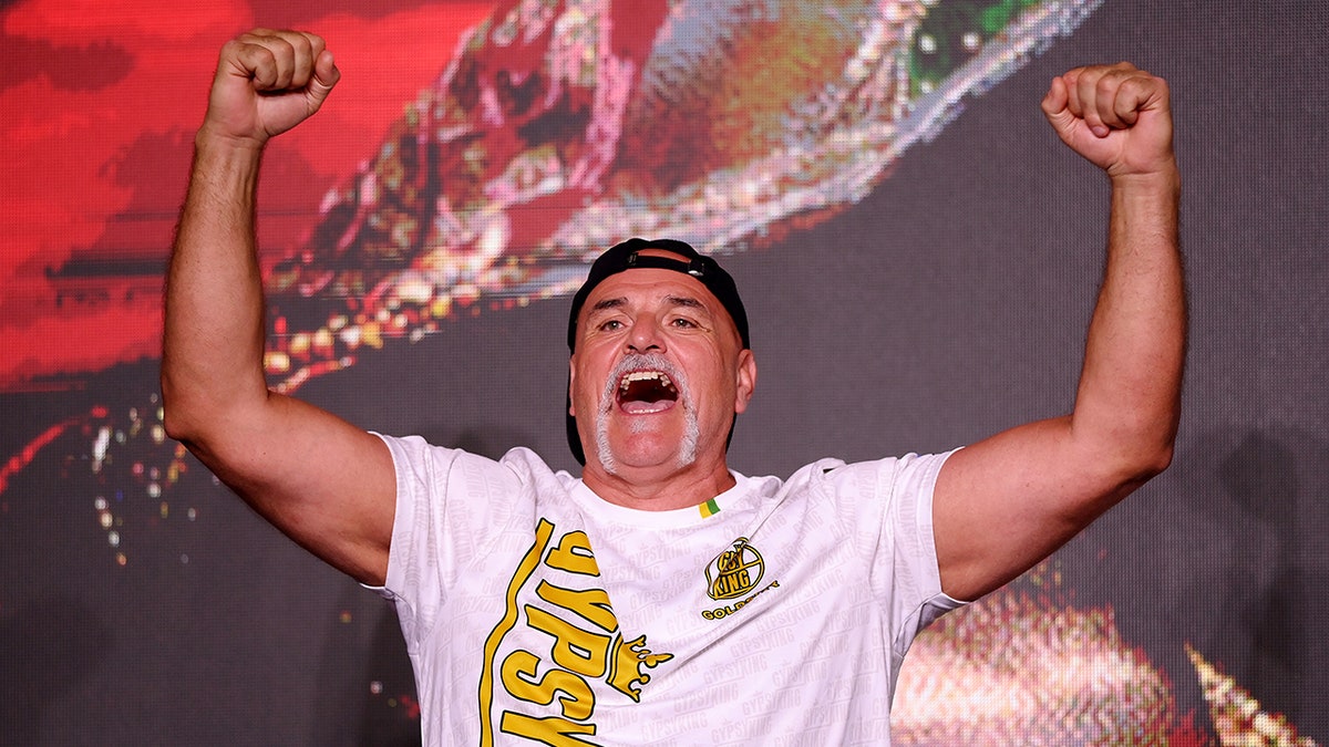 John Fury reacts on stage