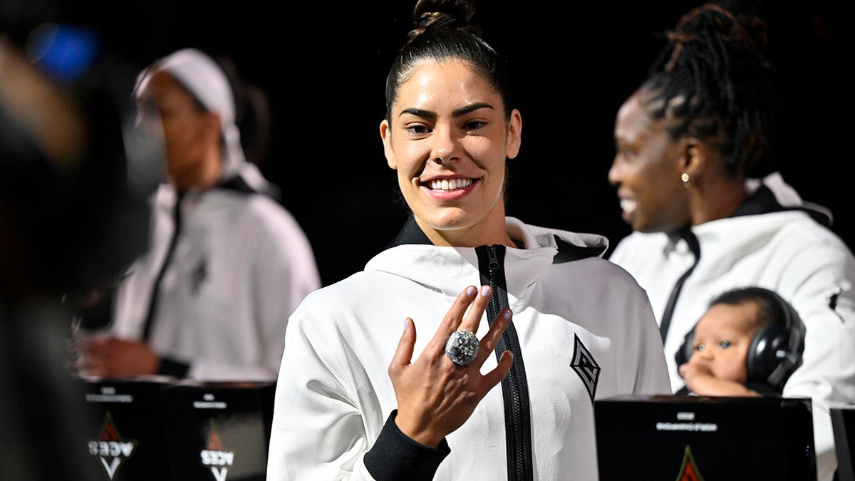 Kelsey Plum shows off her ring