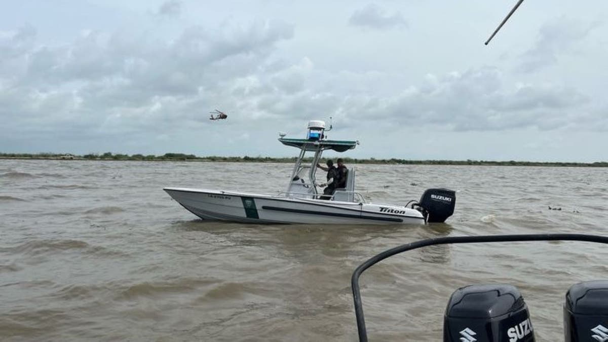 Image of boat stranded in water