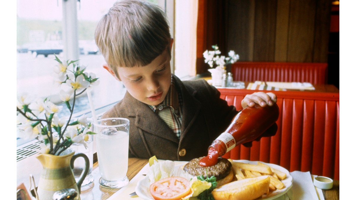 Boy with ketchup