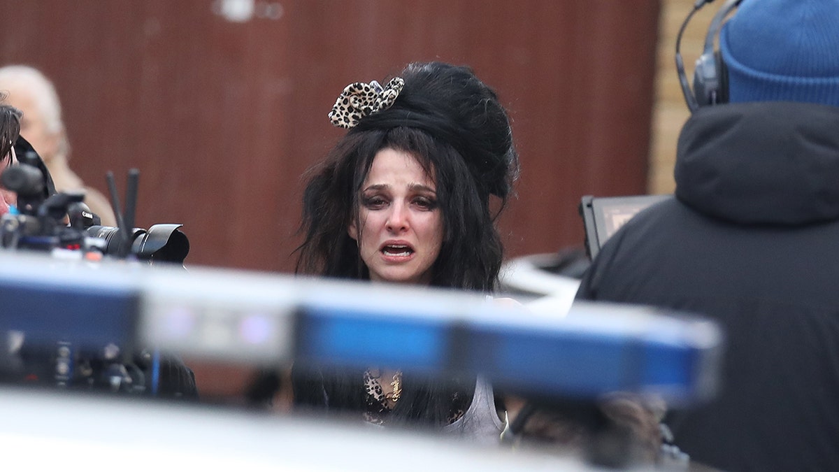 Marisa Abela crying in character as Amy Winehouse