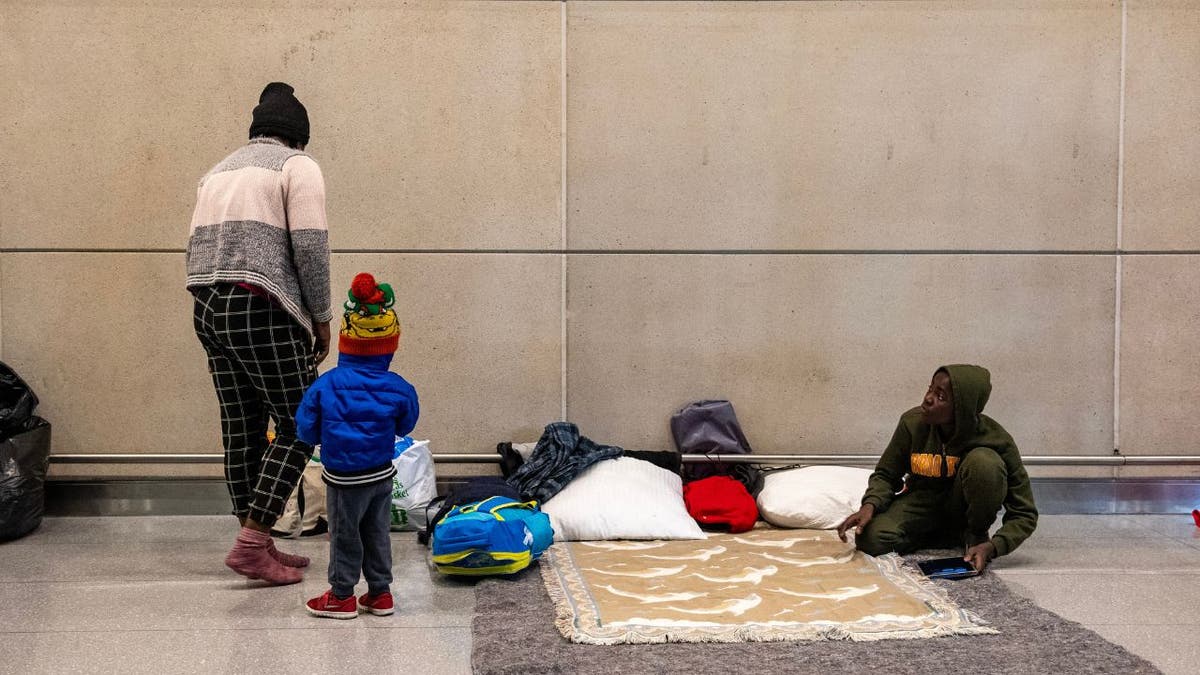 Migrants sleeping at Logan Airport