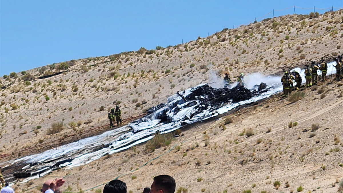 Fire suppression efforts at scene of military fighter jet crash