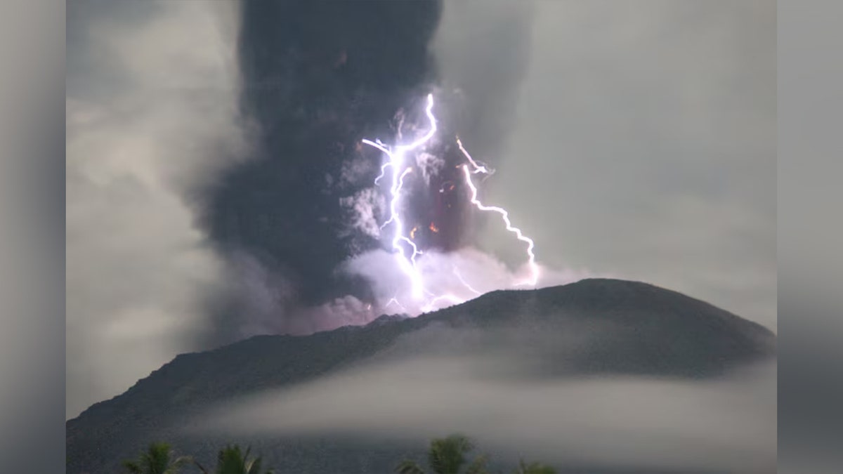 Purple lightening near the volcano's crater