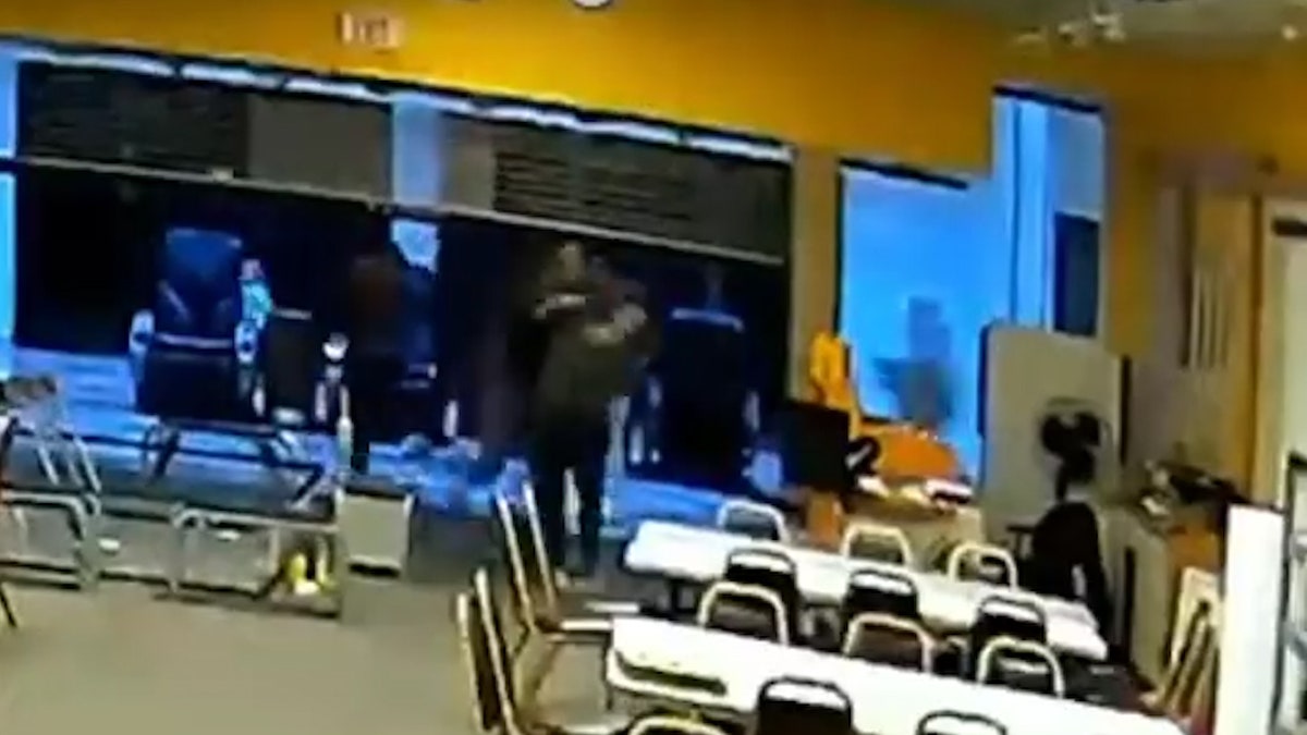 Victim swarmed by assailants and punched in the head from behind