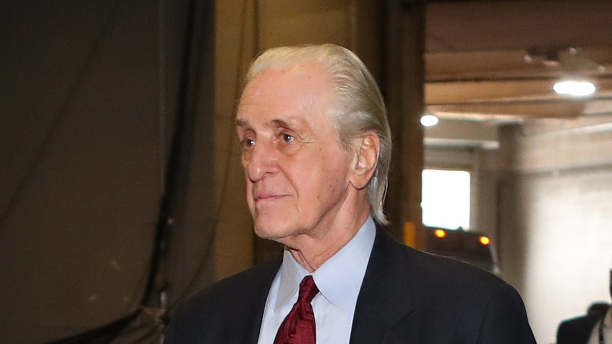 Pat Riley enters the arena