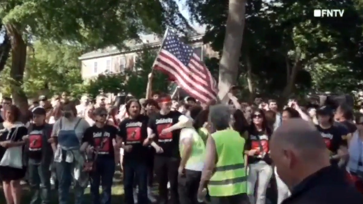 Patriotic students activity emblem down anti-Israel protesters