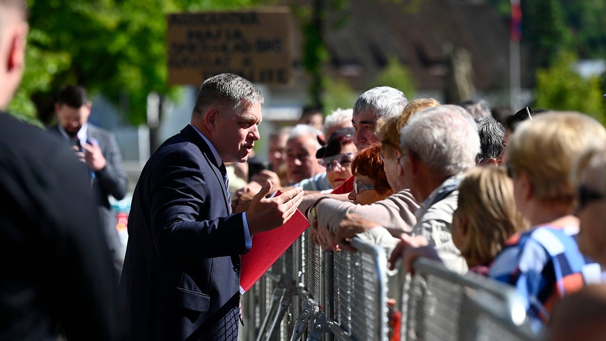 Robert Fico greets people in Slovakia