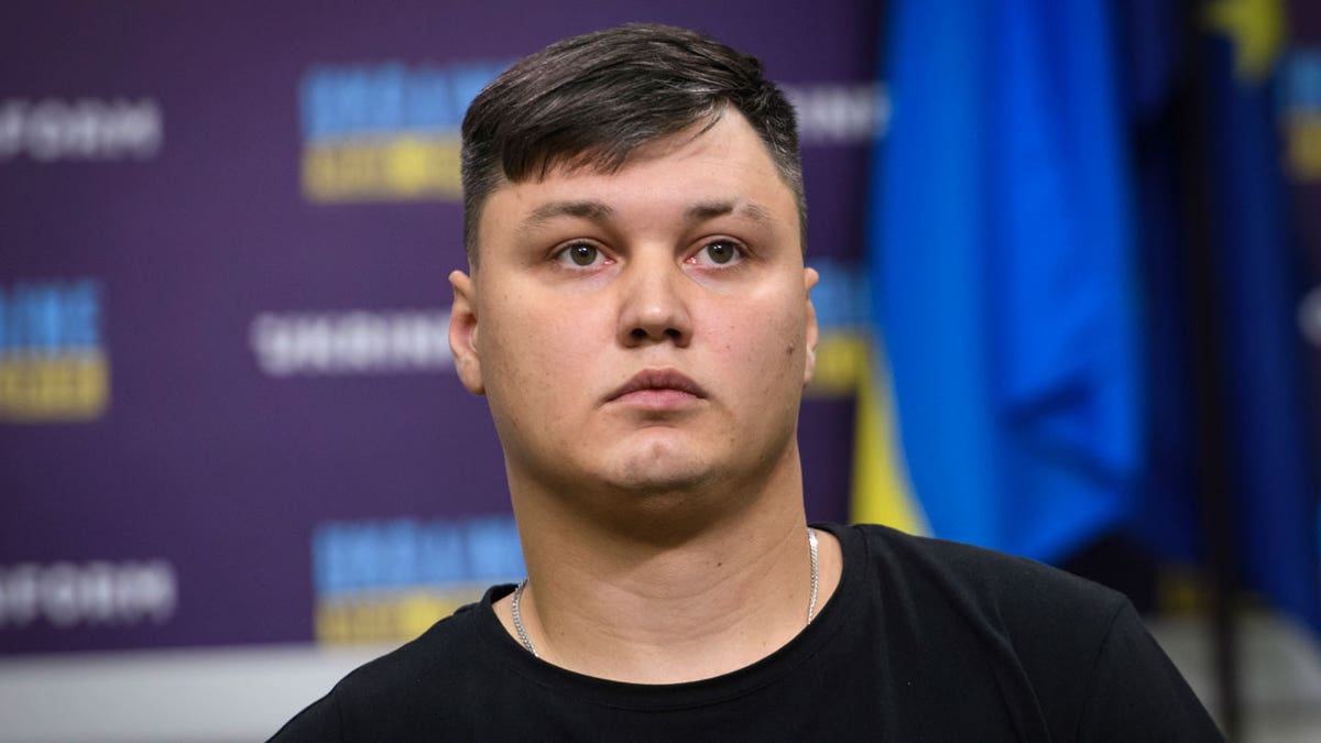 Russian defector Maksim Kuzminov attends a news conference in Kyiv, Ukraine