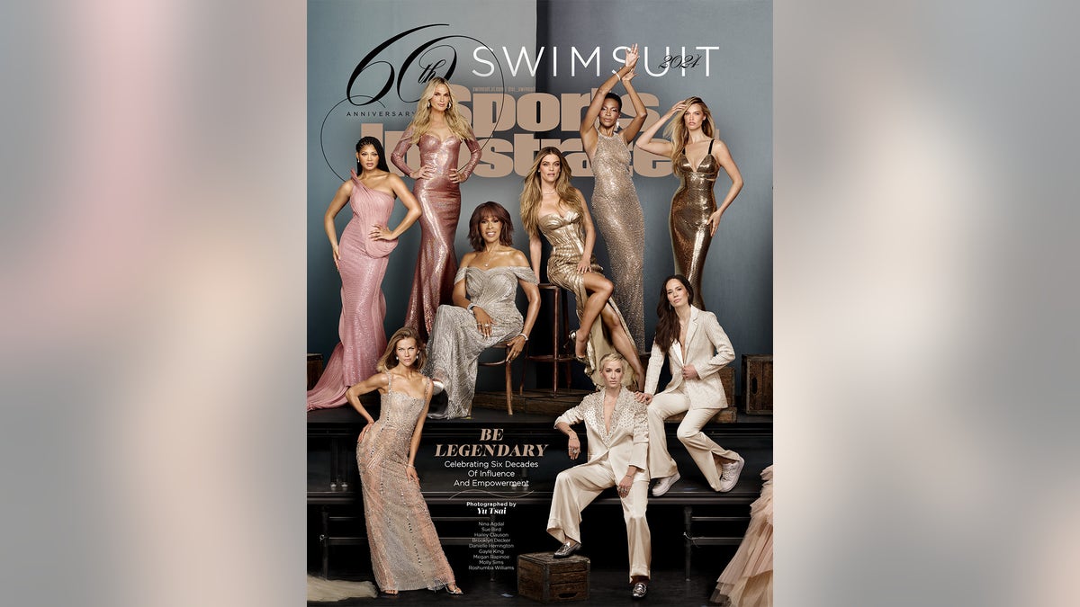 A group of SI Swimsuit models posing together for the 60th anniversary issue