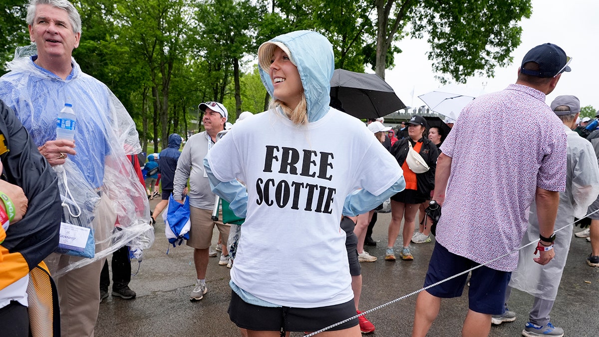 Woman in 'Free Scottie' shirt
