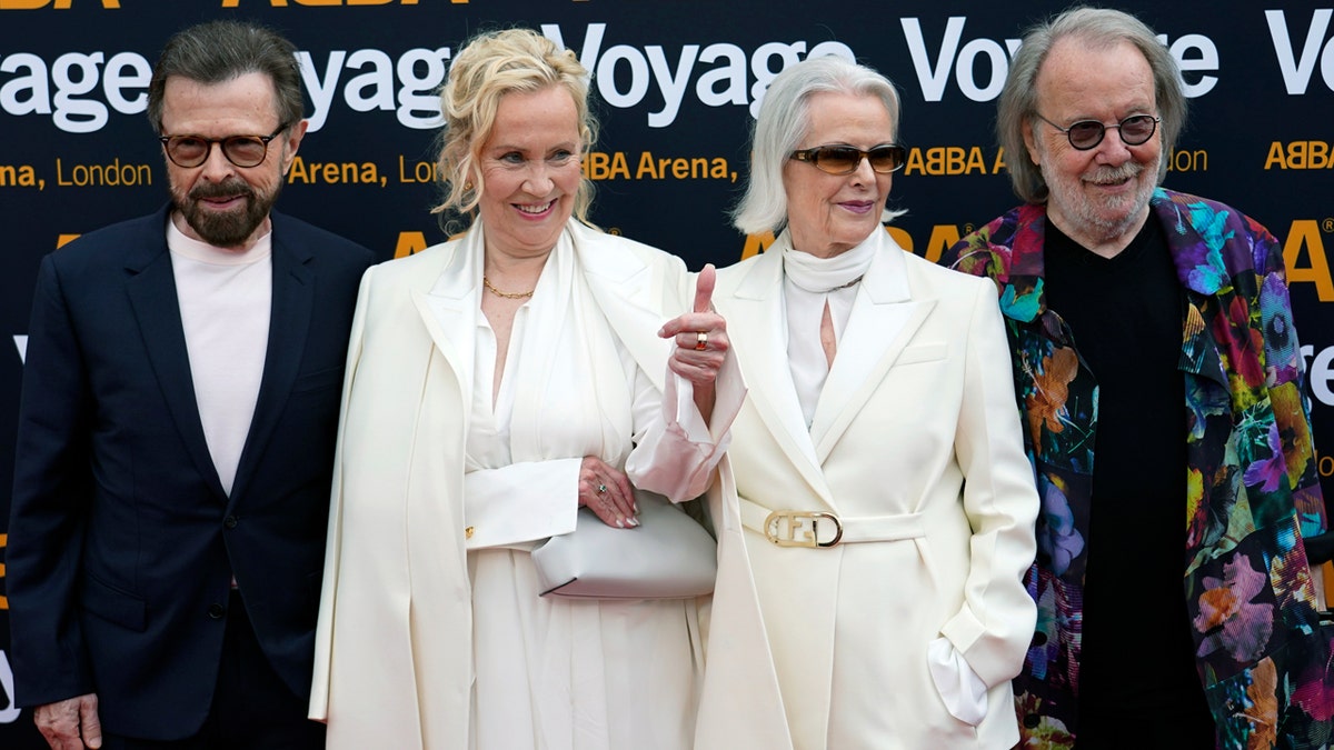 Members of ABBA, from left, Bjorn Ulvaeus, Agnetha Faltskog, Anni-Frid Lyngstad and Benny Andersson arrive for the ABBA Voyage concert at the ABBA Arena in London