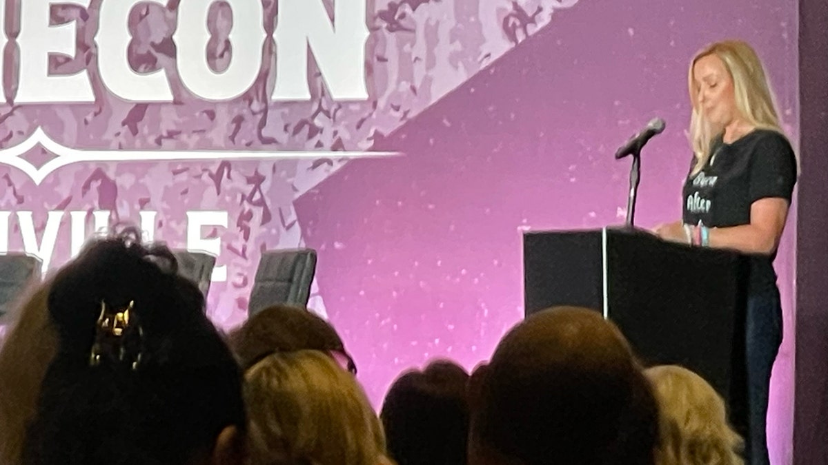 Tara Petito delivers remarks during a panel session at CrimeCon 2024 in Nashville, Tennessee.