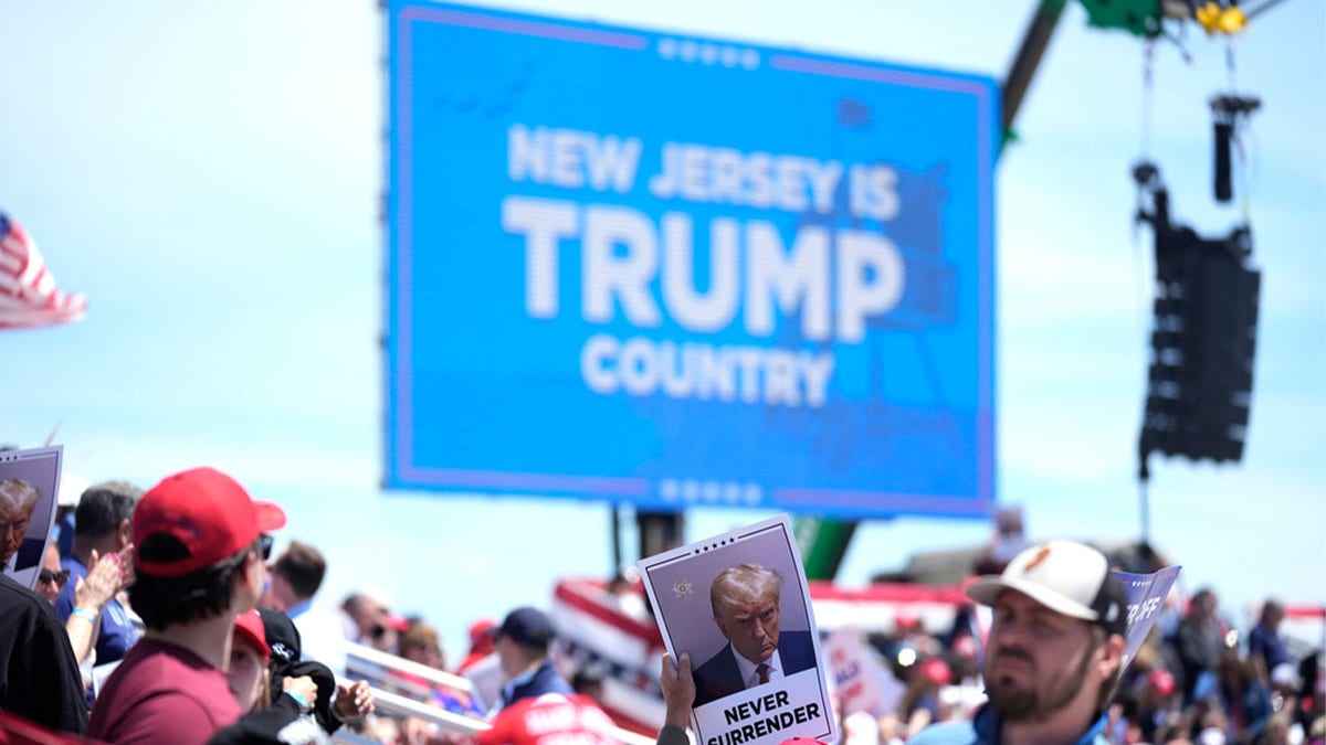People gather ahead of a campaign rally for former President Trump in Wildwood, New Jersey, Saturday.