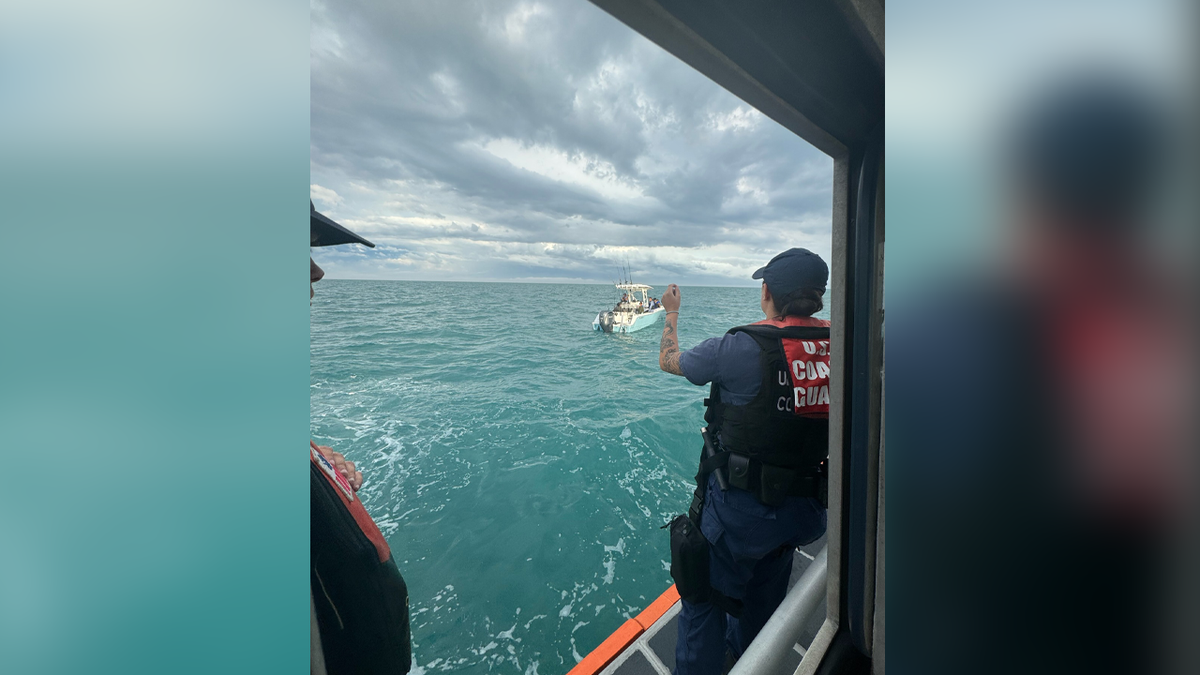 Crews working to rescue family and captain from boat