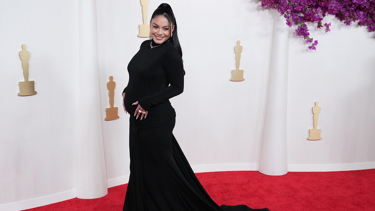 Vanessa Hudgens showing her baby bump on the red carpet