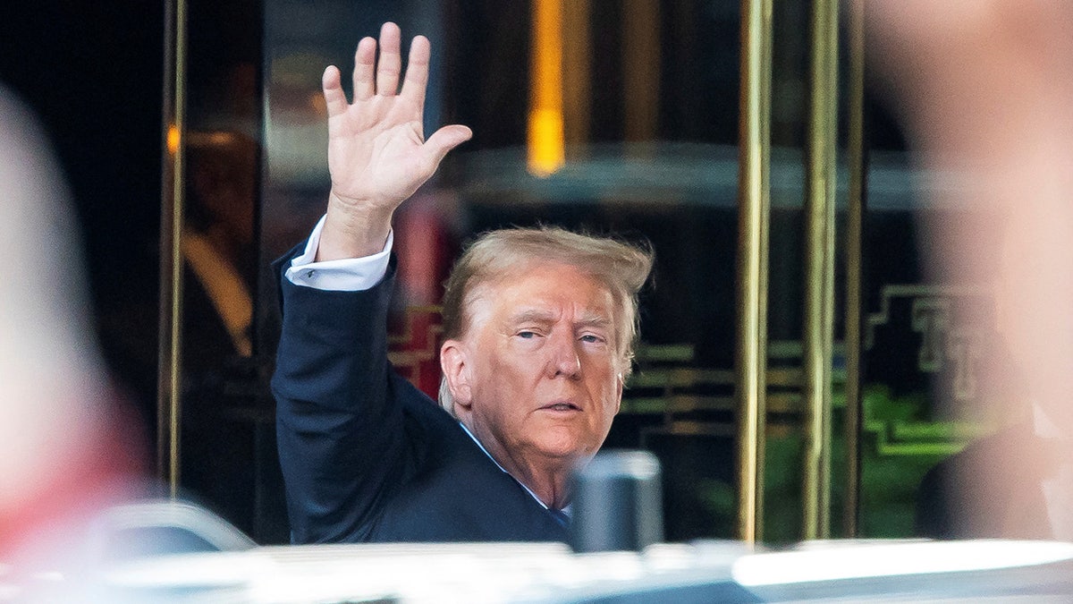 Donald Trump exiting Trump Tower