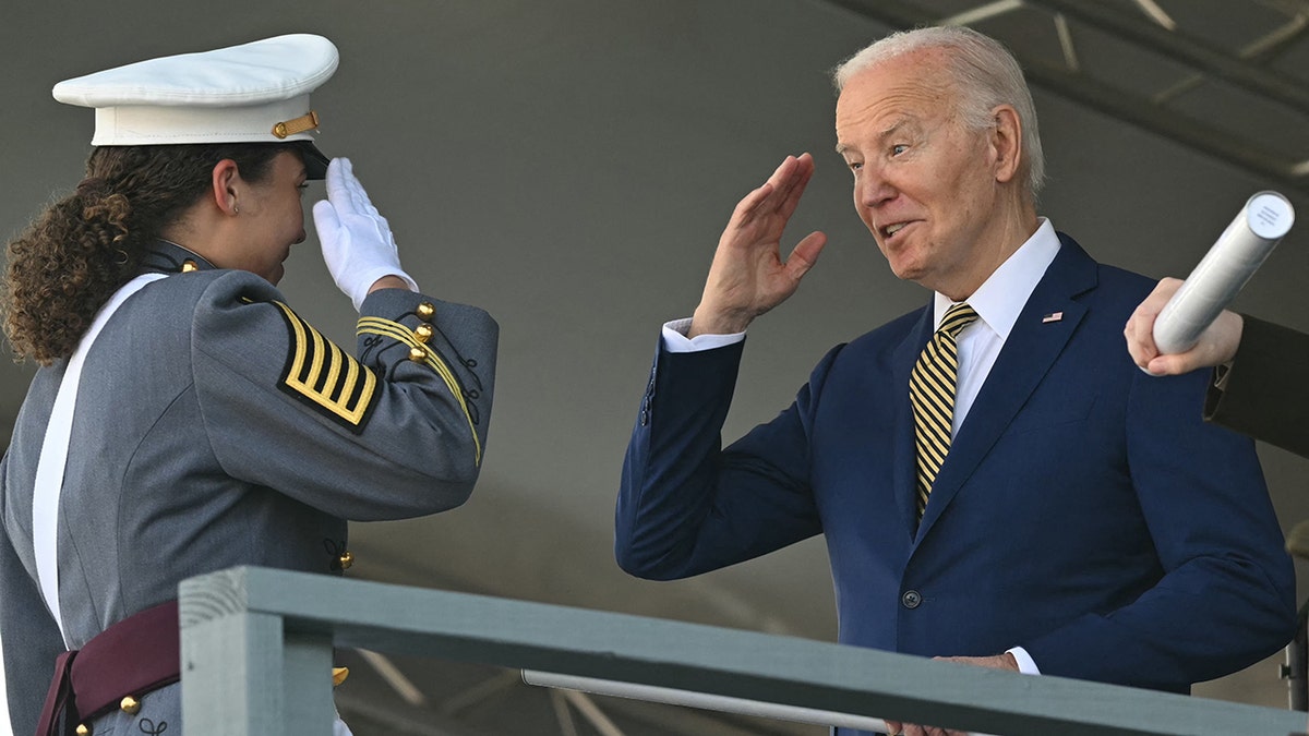 President Biden greets the West Point graduate