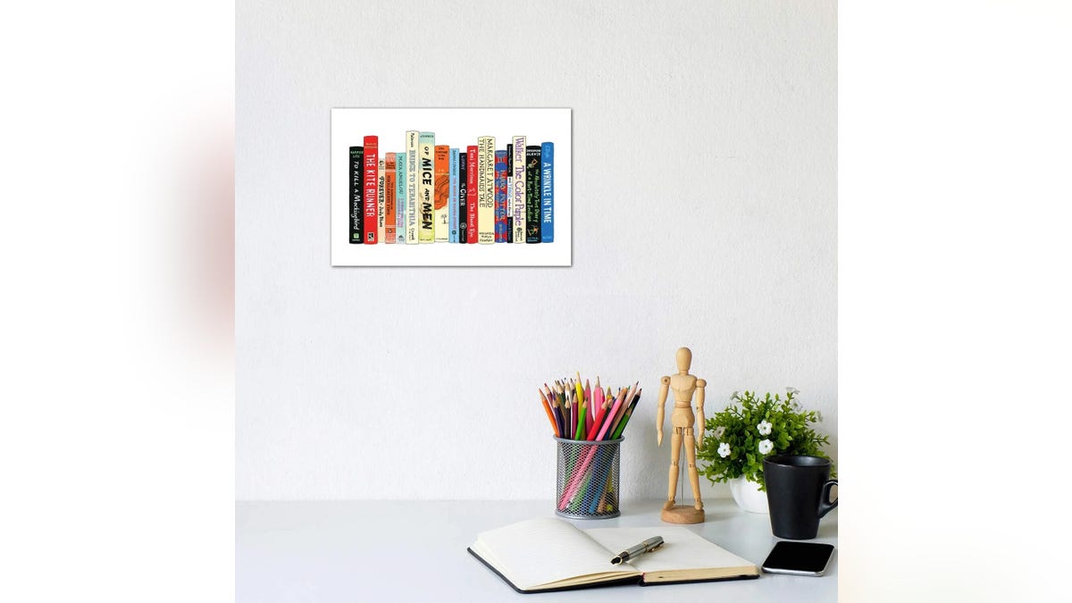 Gift him some art for his reading nook.