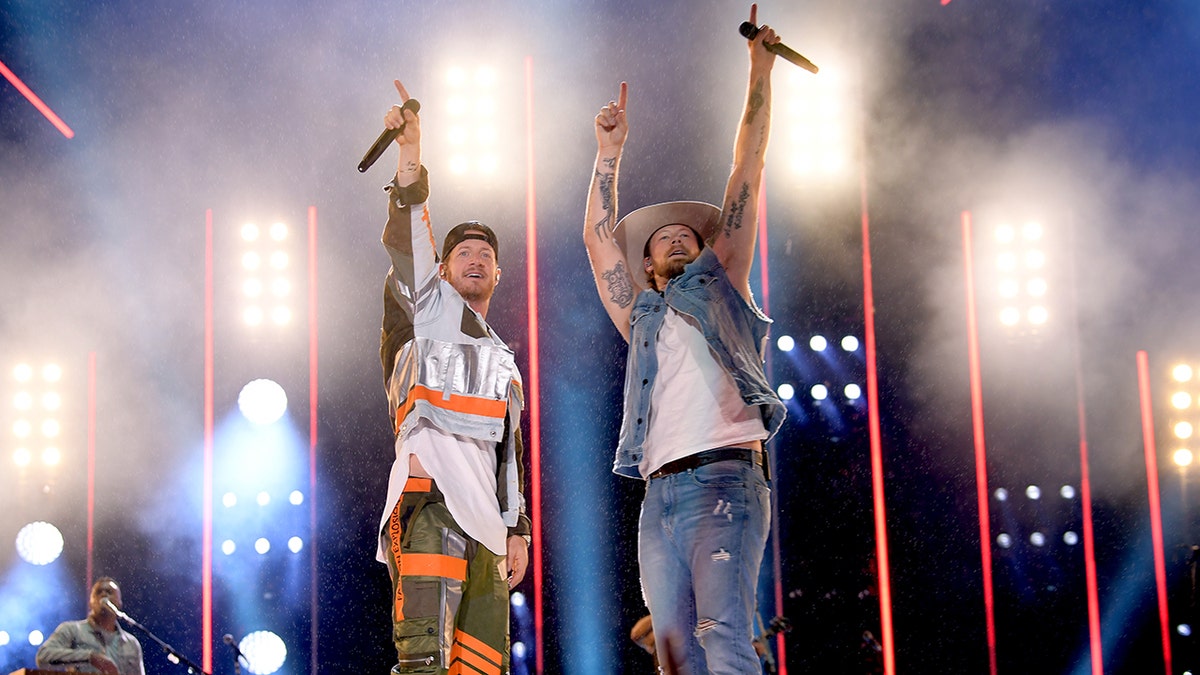 Brian Kelley and Tyler Hubbard on stage performing