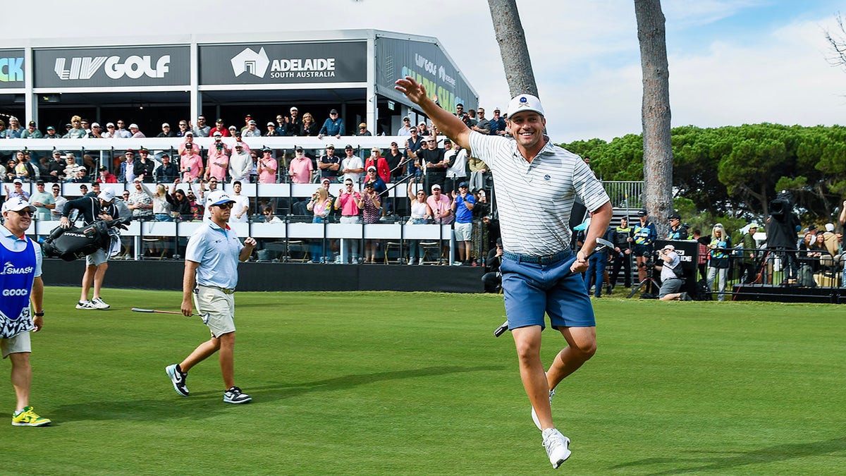 Bryson Dechambeau celebrates