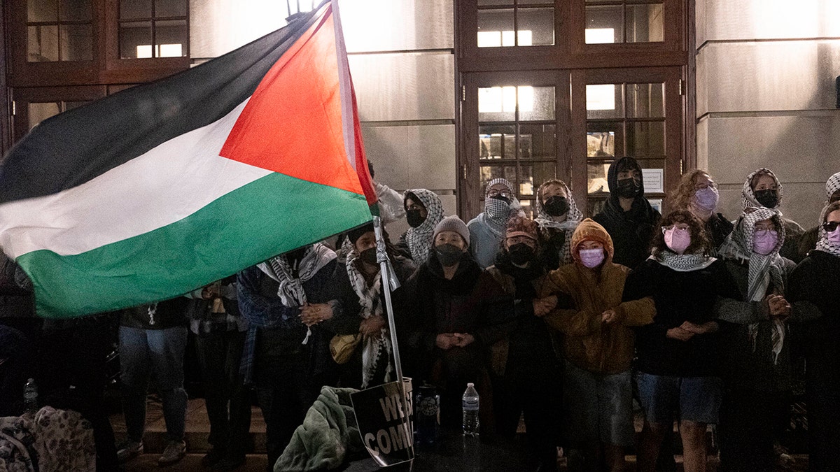 Palestinian flag in midst of anti-Israel agitators at Columbia University