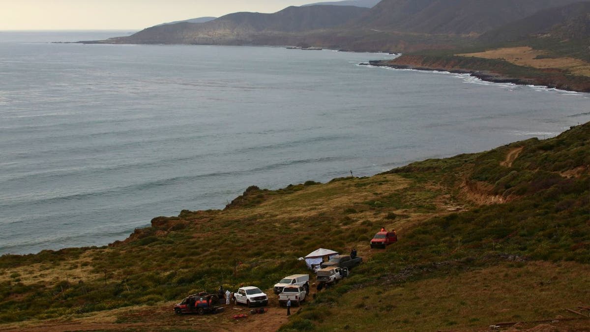 View of hillside area where rescuers search for missing tourists in Mexico