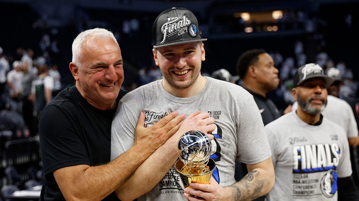 Luka Doncic celebrates with his dad