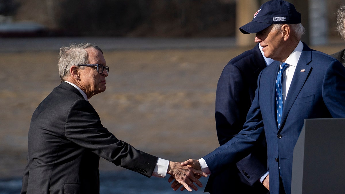 President Biden shakes hands with Ohio Gov. Mike DeWine in January 2023