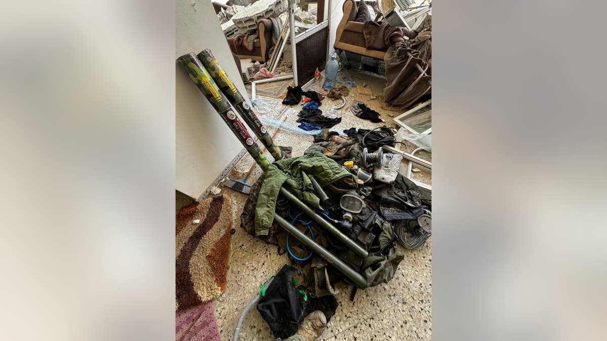 Israeli forces conducted a raid against a Hamas compound in Gaza on Tuesday, uncovering a tunnel and a significant cache of weapons and explosives.