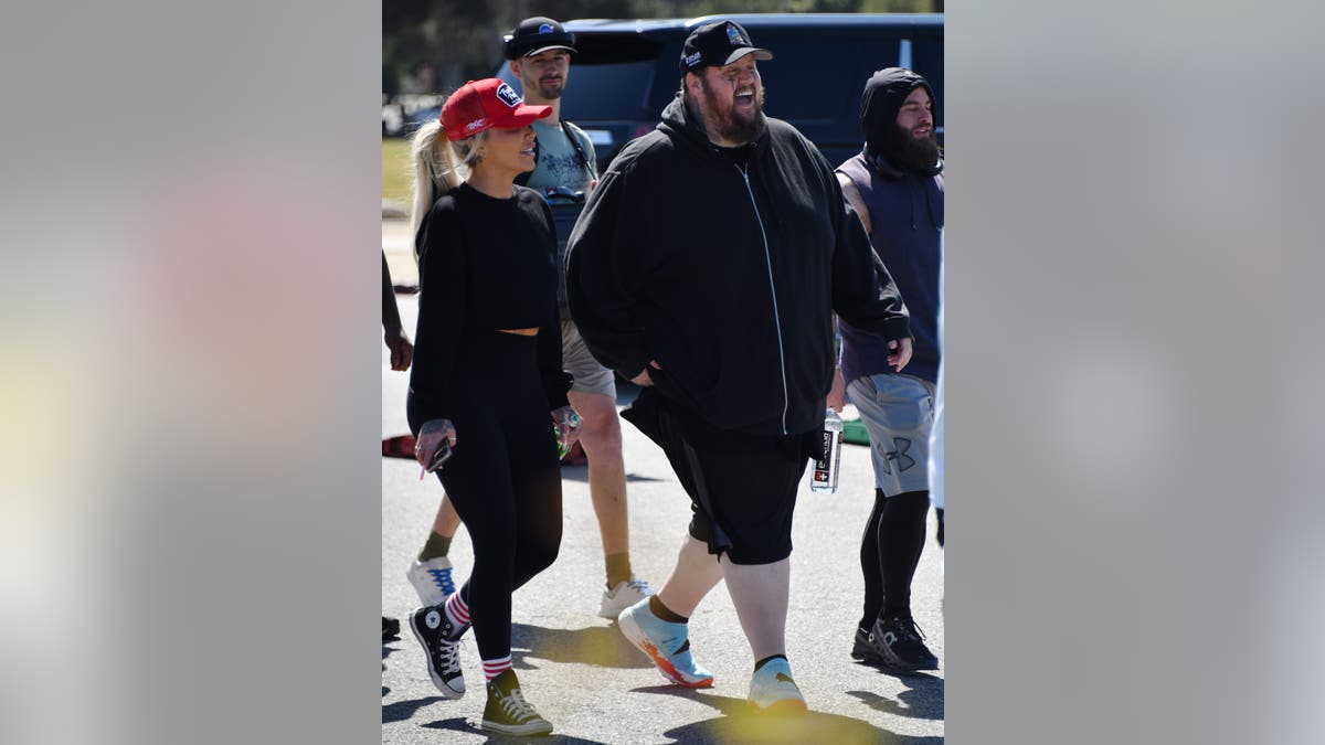 Jelly Roll walking the 5K with his wife