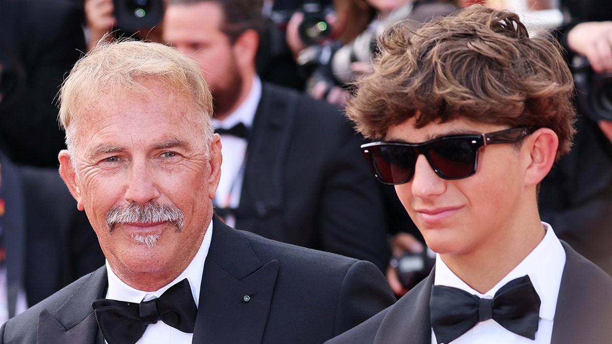 Kevin Costner and Hayes Costner wear matching black bow ties