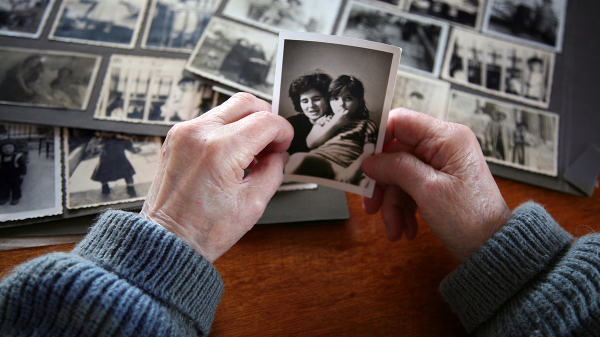 Woman looking at pictures