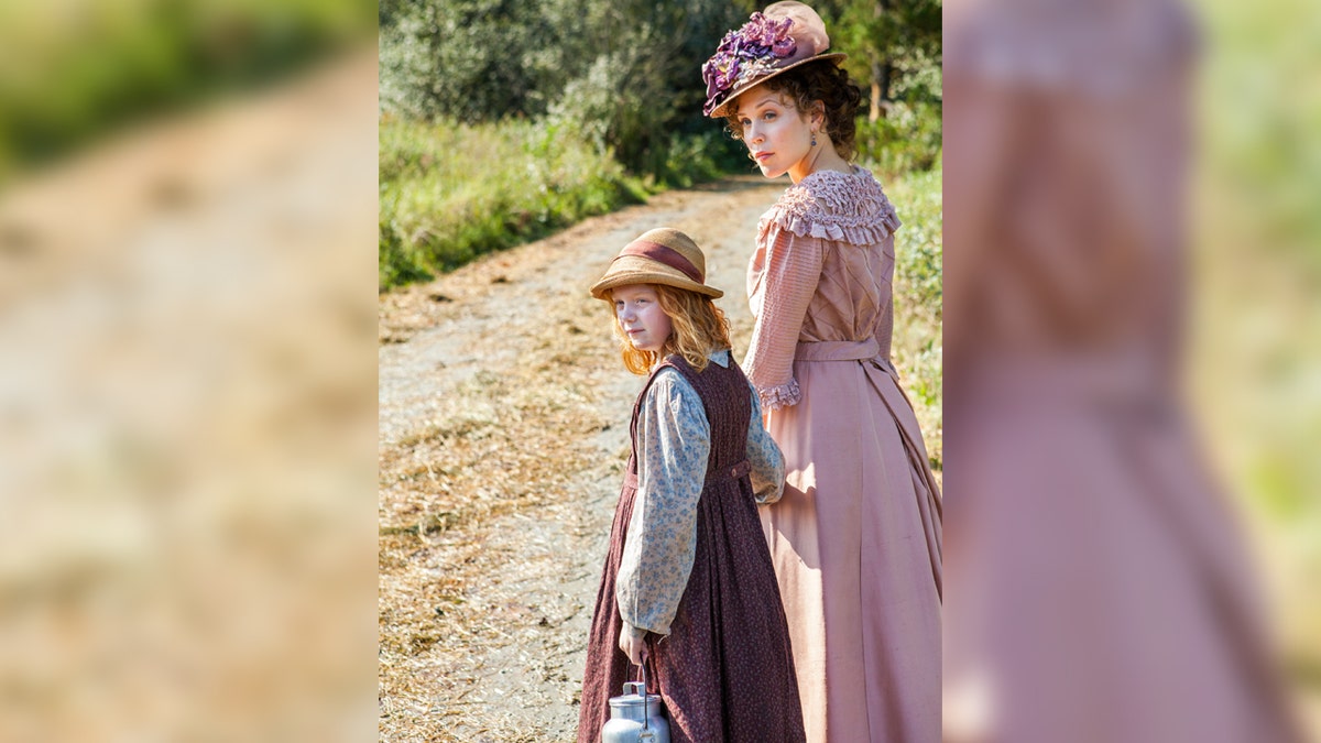 Actress Mamie Laverock in costume for “When Calls the Heart” with Erin Krakow.