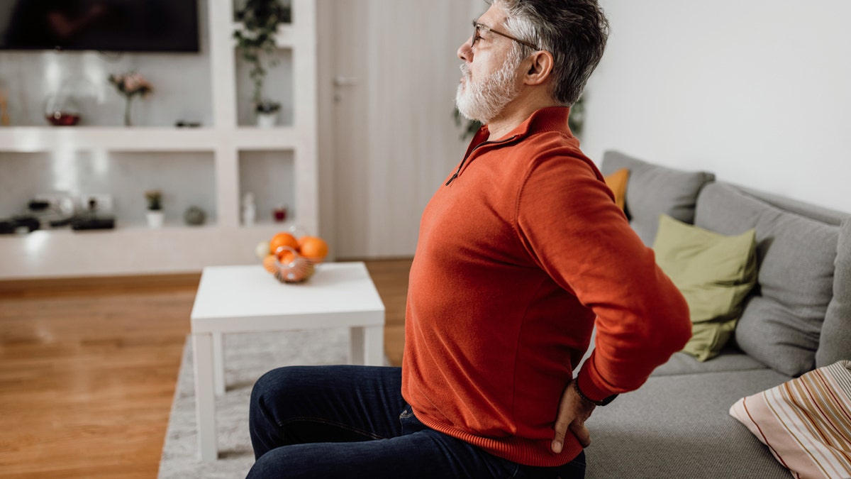 Man stretching back