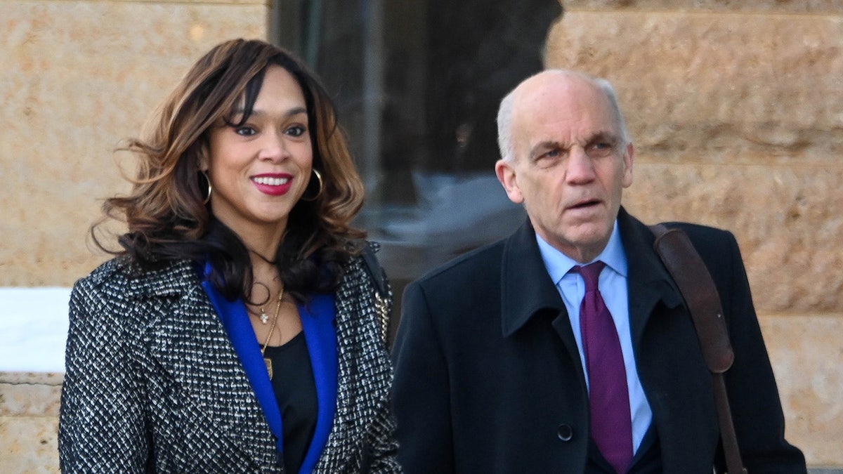 Marilyn Mosby with her lawyer