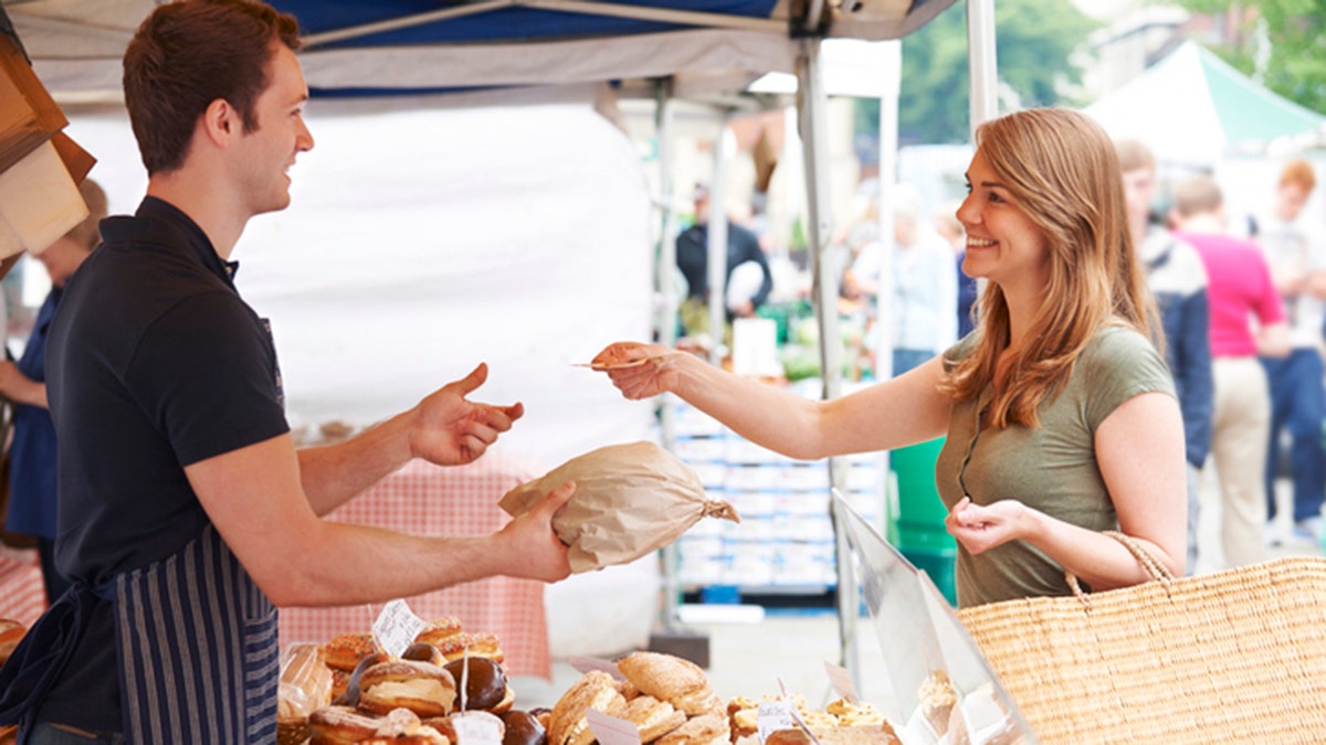 Buying breads at the farmers market