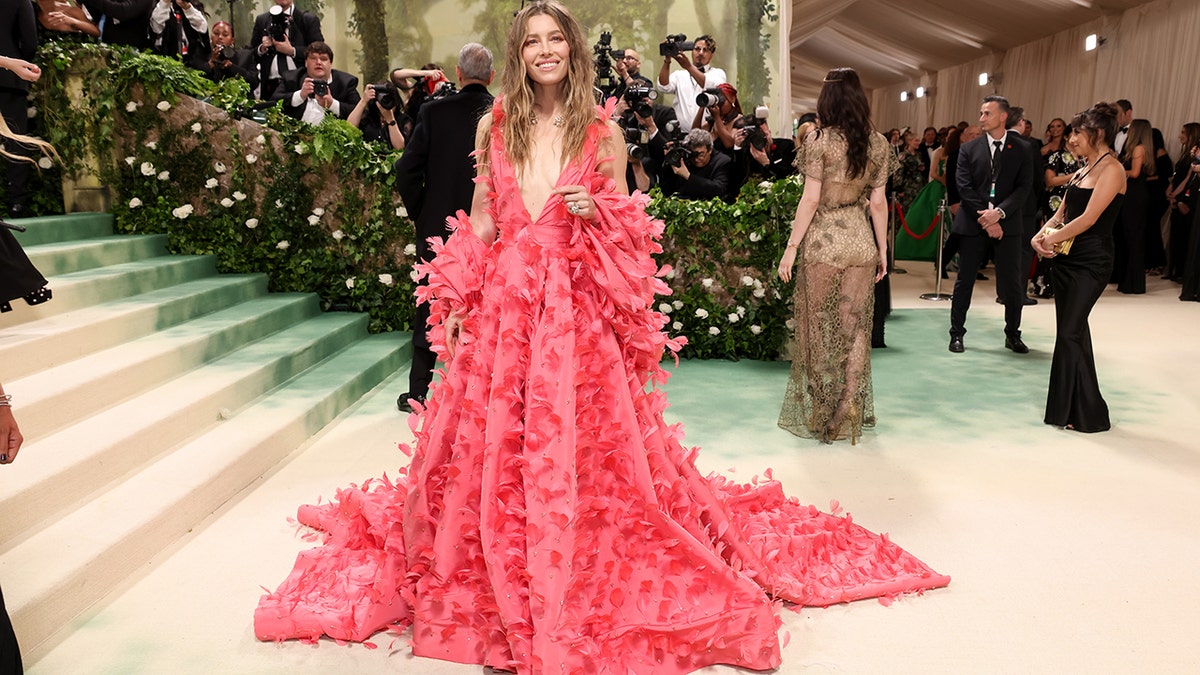 Jessica Biel sports billowing pink gown to the Met Gala.