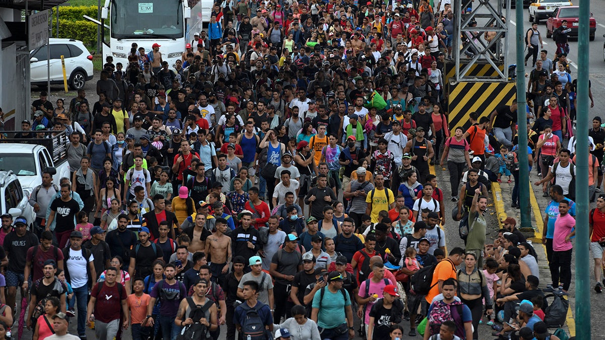 Latin American migrants take part in a caravan towards the border with the United States, in Huehuetan, Chiapas state, Mexico, on June 7, 2022.?