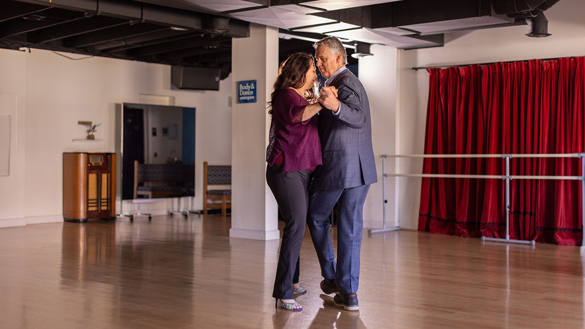 Roxanne and Carter Maier dance in their studio