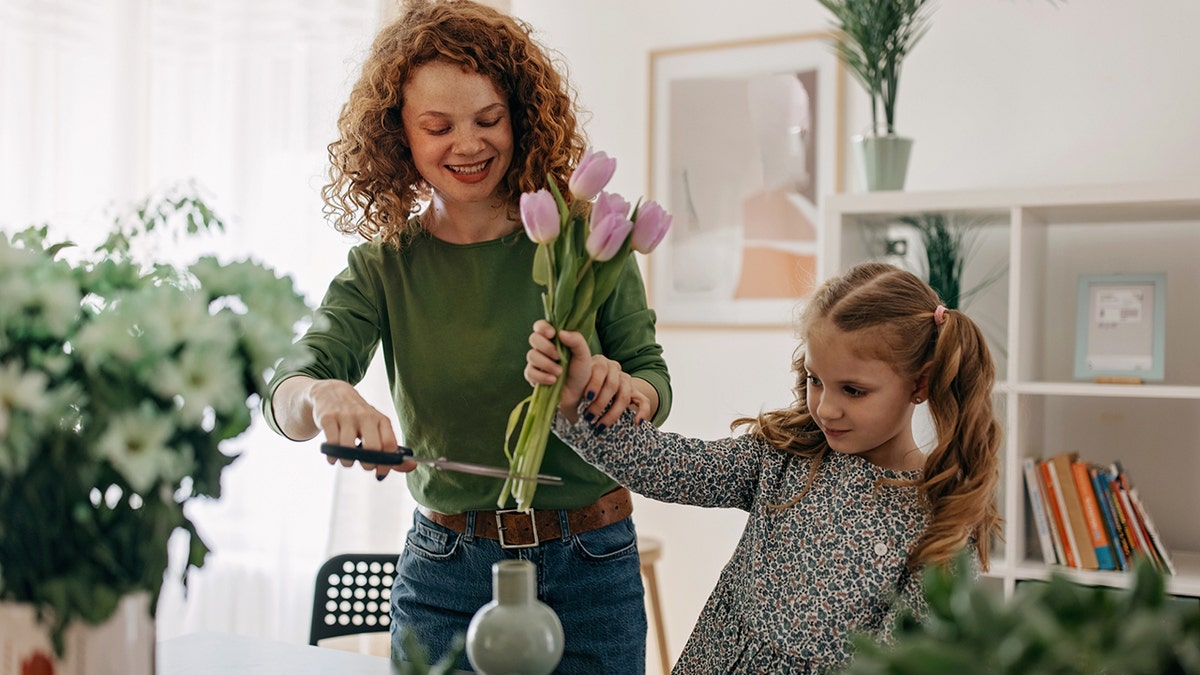 mother-and-daughter-cutting-flowers