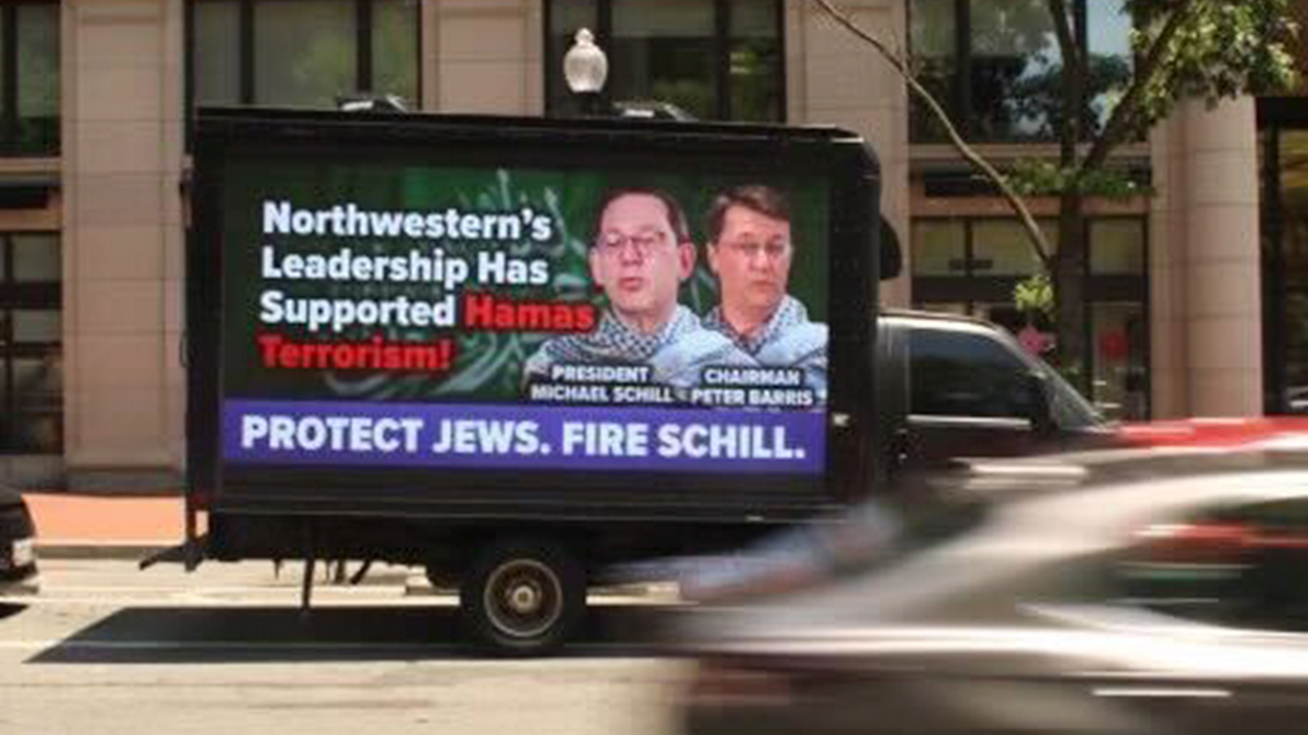 protest van with sign reading "protect Jews. Fire Schill."