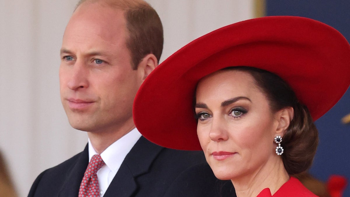 prince william and kate middleton look somber