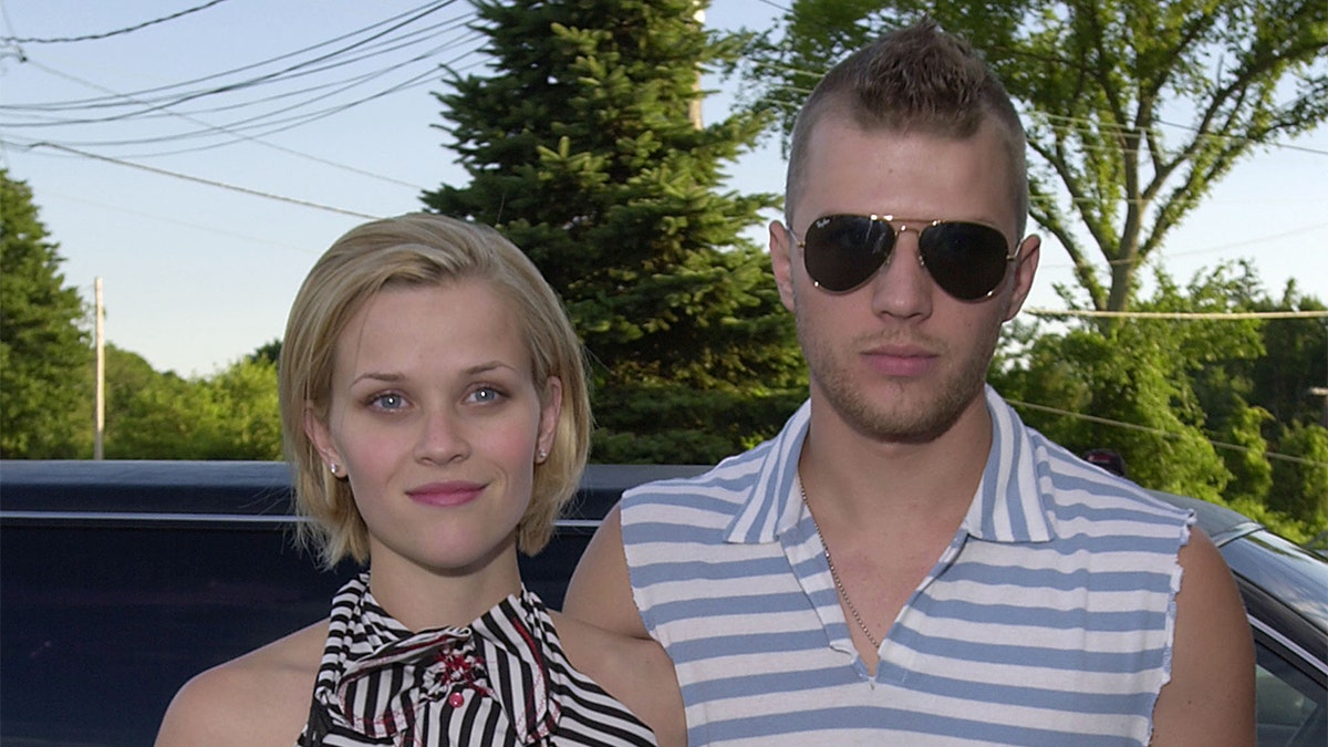 Reese Witherspoon and Ryan Phillippe posing together at a Legally Blonde party