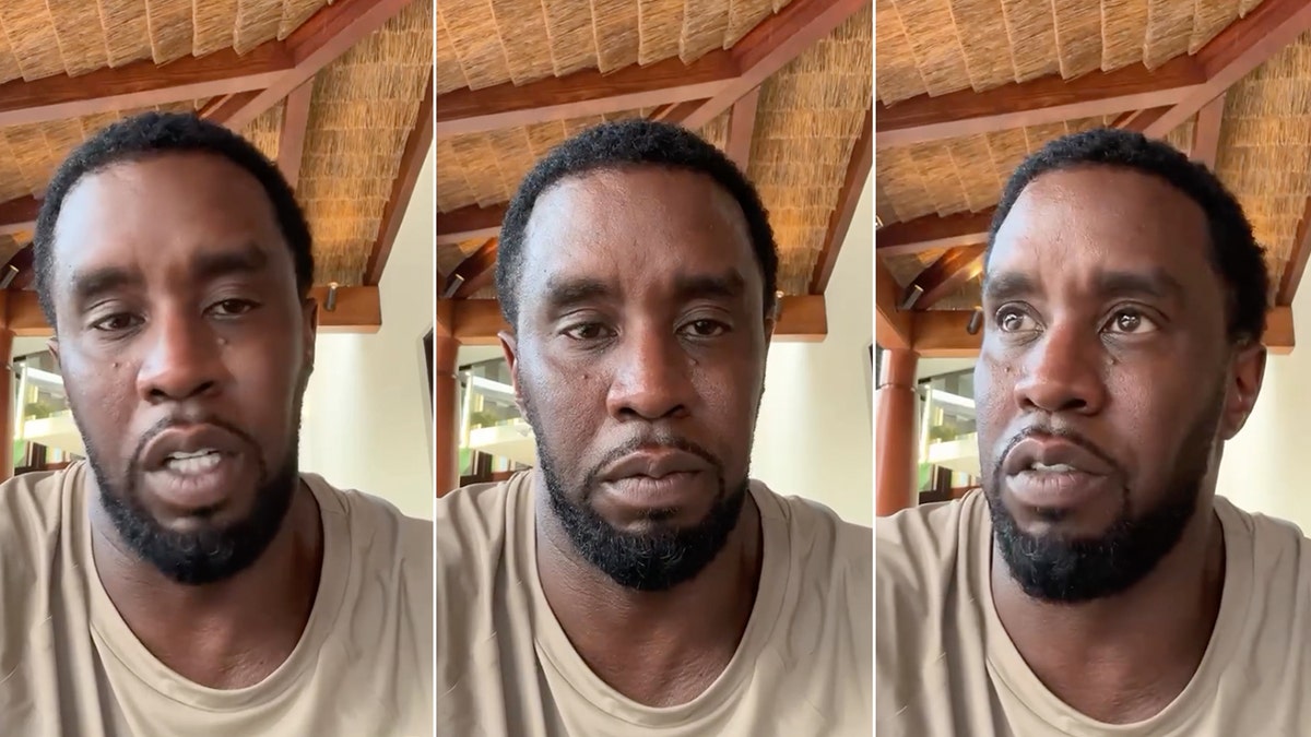 Sean Combs in a tan shirt looks tired as he talks to the camera