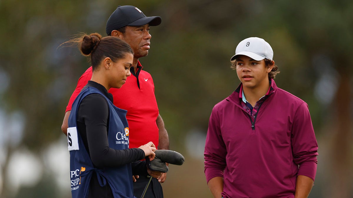 Tiger Woods with Sam and Charlie