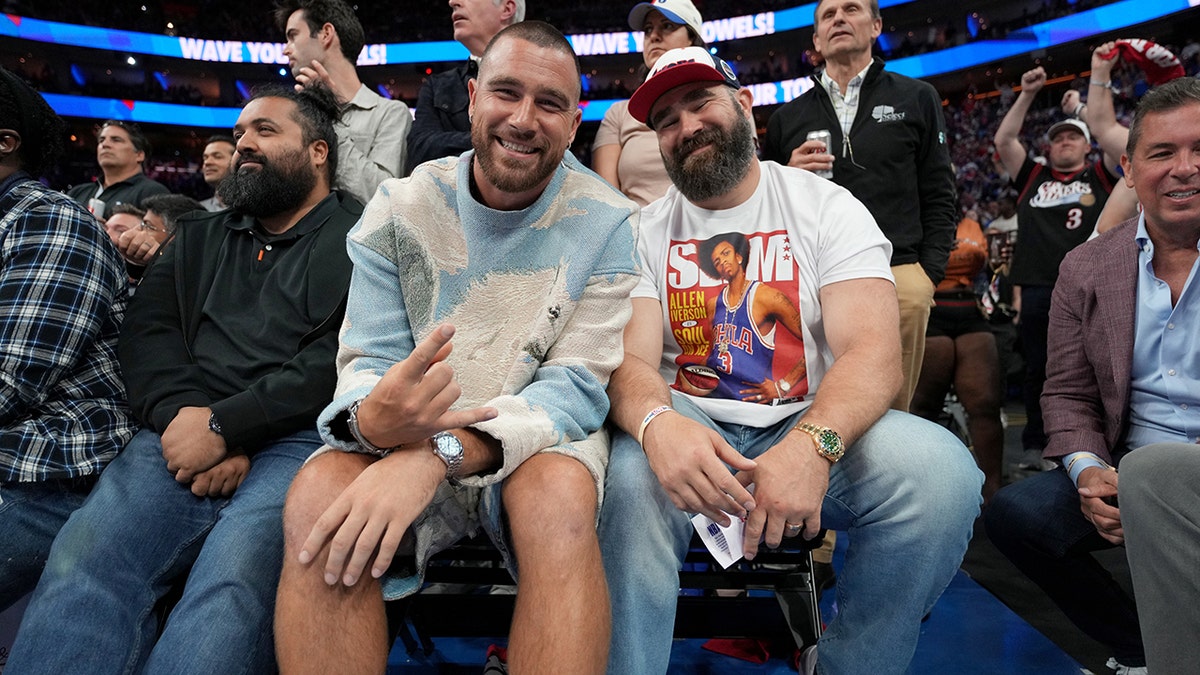 Travis and Jason Kelce at a basketball game