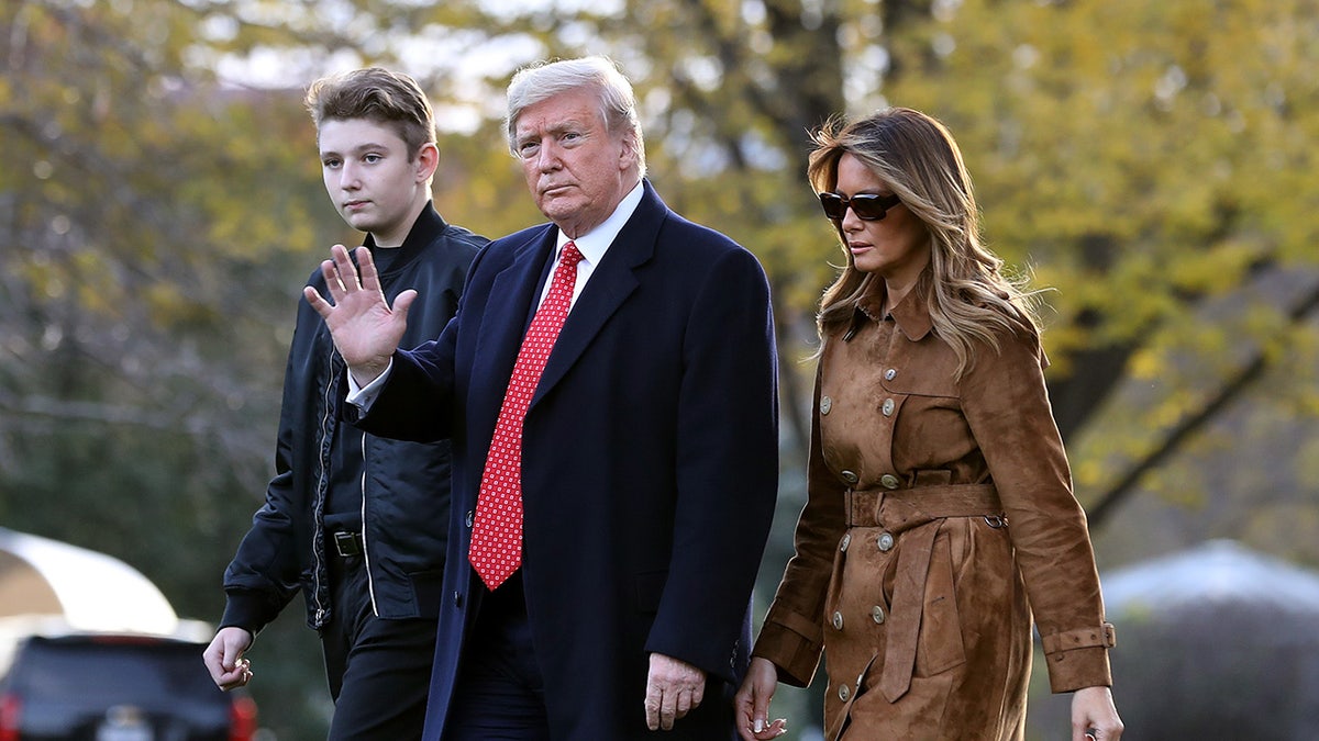 Barron with his parents in 2019