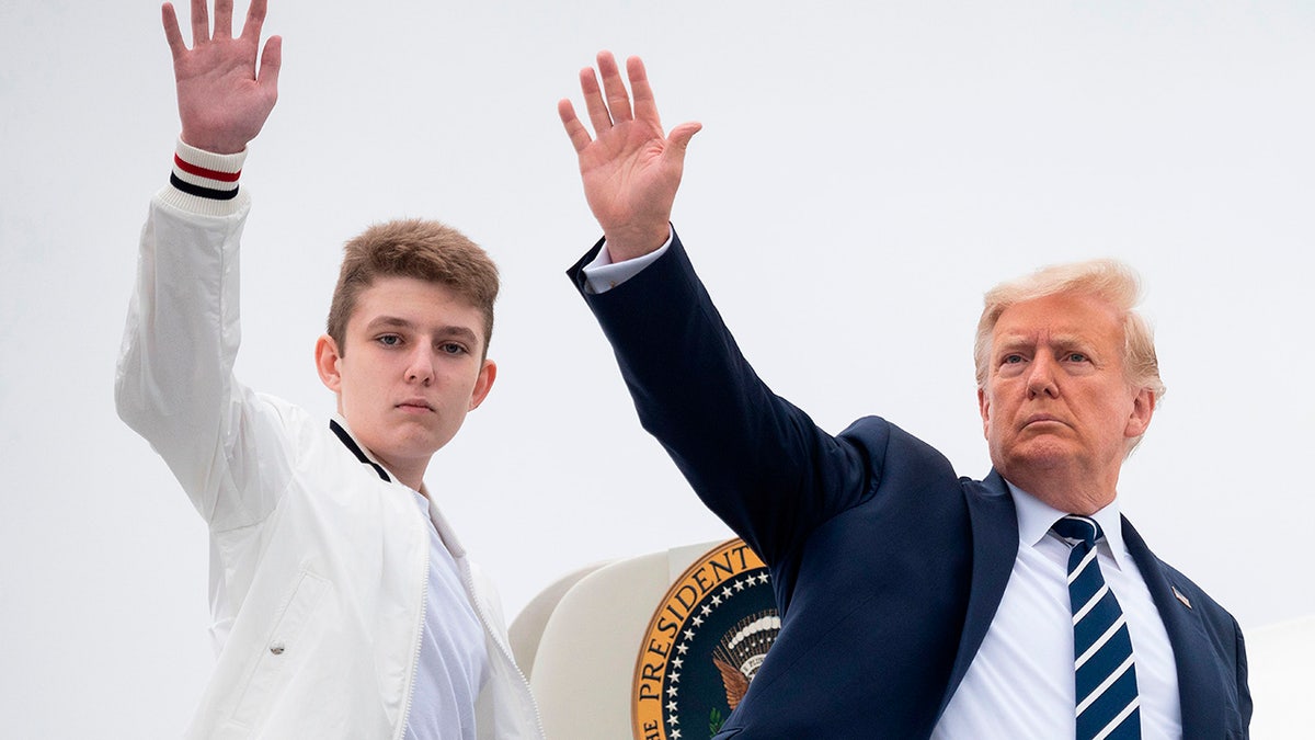 Trump and son Barron waving